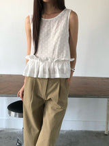 White dotted pattern vest w/ peplum hem