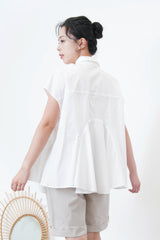 White shirt w/ peplum hem details