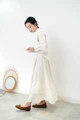 Ivory asy. Vest in fringe trimming