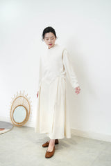 Ivory asy. Vest in fringe trimming