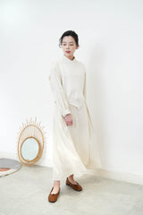 Ivory asy. Vest in fringe trimming