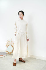 Ivory asy. Vest in fringe trimming