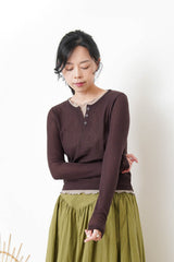 Brown button top in contrast layer