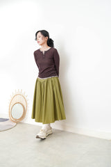 Brown button top in contrast layer