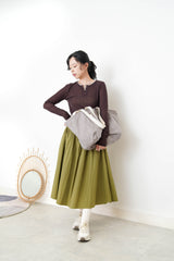 Brown button top in contrast layer