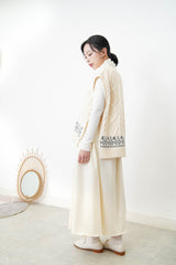 Ivory knit vest w/ side ribbons