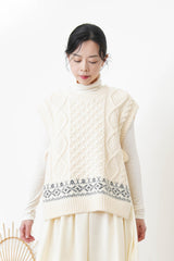 Ivory knit vest w/ side ribbons