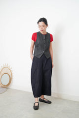 Black dyed denim style vest in split hem