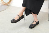 Black outlined mary jane ballet flats