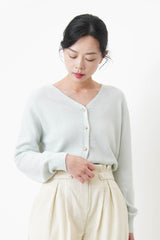 Pastel blue cardigan w/ rose gold buttons