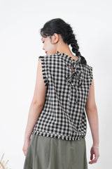 B/W checked vest in fringe trimmed