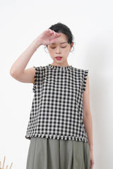 B/W checked vest in fringe trimmed