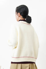 Ivory sweater w/ contrast stitching