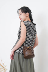 B/W checked vest in fringe trimmed