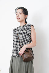 B/W checked vest in fringe trimmed