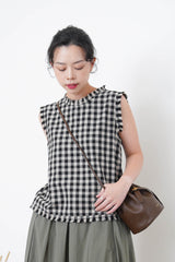 B/W checked vest in fringe trimmed