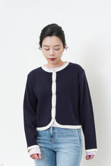 Navy outlined cardigan in round hem