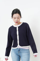 Navy outlined cardigan in round hem