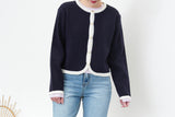 Navy outlined cardigan in round hem