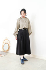 Black A cut skirt in contrast fringe trimmed