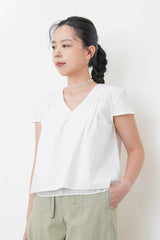 White v neck shirt w/ layering hem