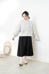 Grey sweater in crochet net details