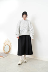 Grey sweater in crochet net details