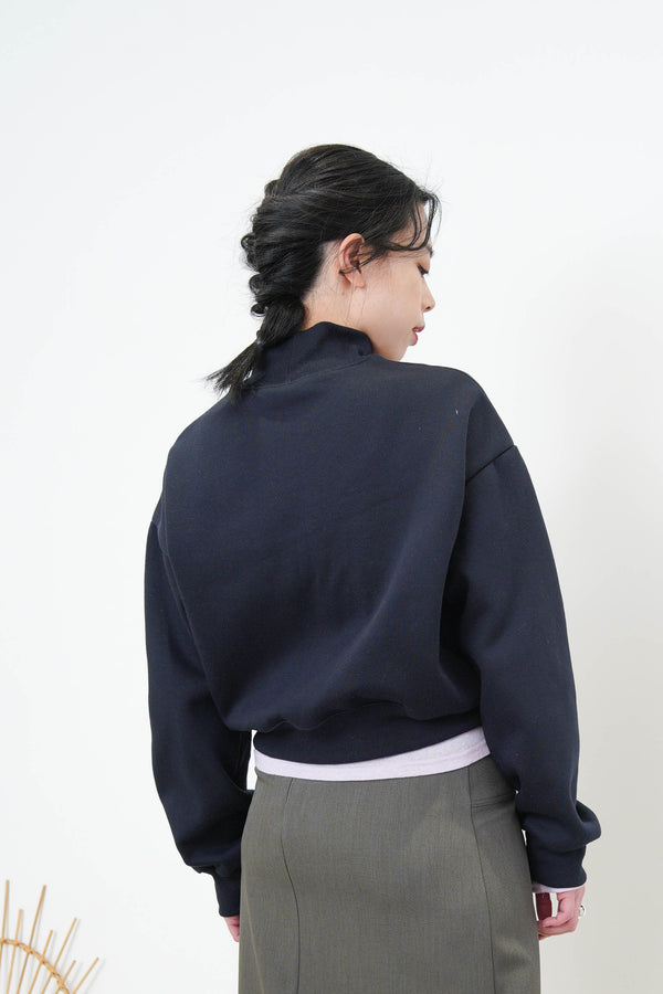 Navy turtle neck pullover w/ embroidery