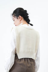 Ivory knit vest in side split ribbons