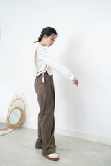 Ivory knit vest in side split ribbons