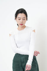 White patchwork crop top in cut out shoulders