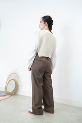 Ivory knit vest in side split ribbons