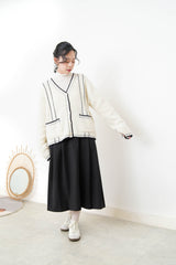 Black A cut skirt in contrast fringe trimmed