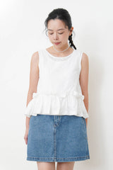 White dotted pattern vest w/ peplum hem