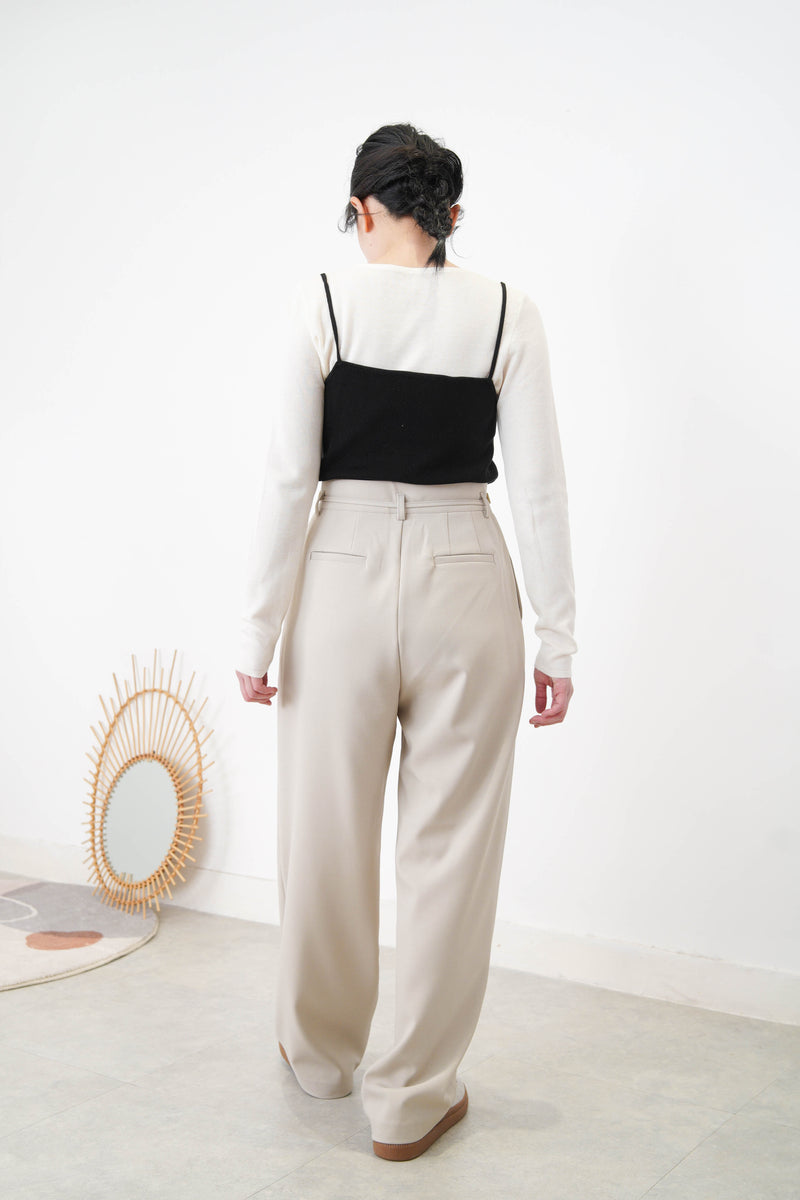 Light beige wide leg trousers w/ strings and buttons