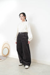 White shirt in detail pleats