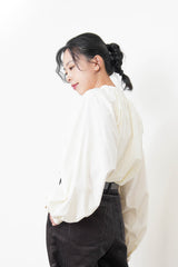 White shirt in detail pleats