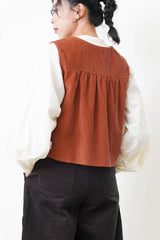 Orange brown corduroy vest