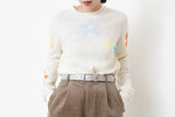 white knit top with floral pattern