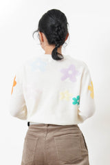 white knit top with floral pattern