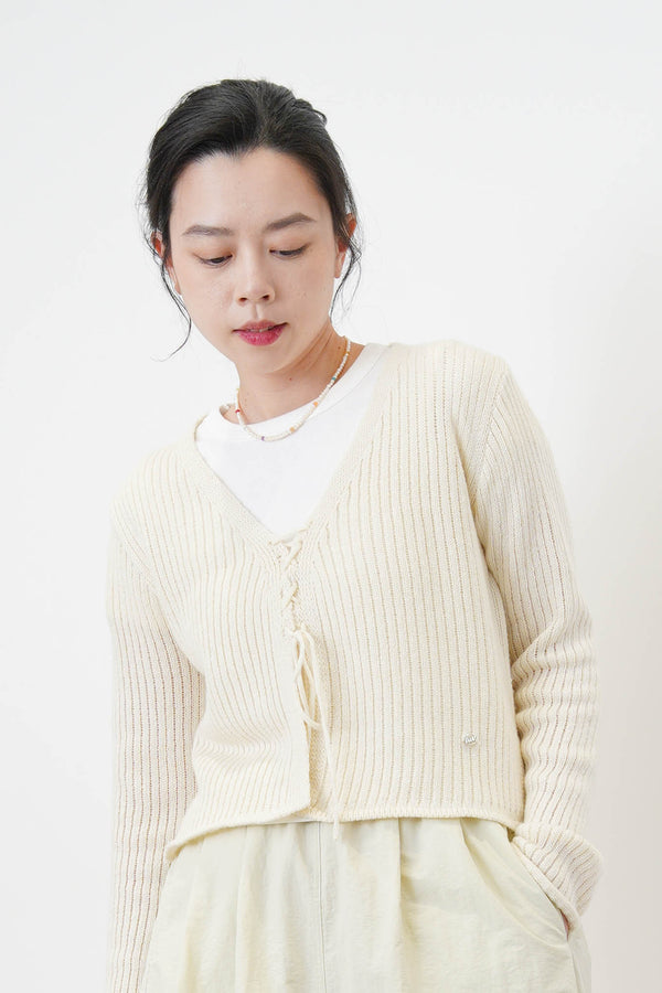 Ivory cardigan w/ strings knot details