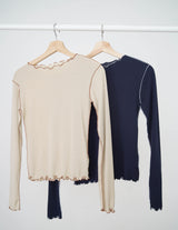 Navy outlined ruffle fringe top