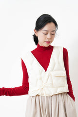 Ivory padded down vest w/ pocket