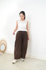 White crochet vest w/ tie string hem