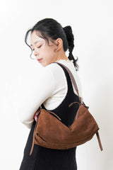 Brown suede leather pillow bag w/ adjustable straps