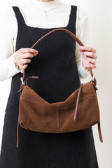 Brown suede leather pillow bag w/ adjustable straps