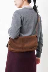 Brown suede leather pillow bag w/ adjustable straps