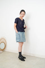 Bleach washed denim skirt in cargo style