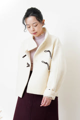 Ivory 100% wool jacket w/ leather buckles