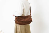 Brown suede leather pillow bag w/ adjustable straps